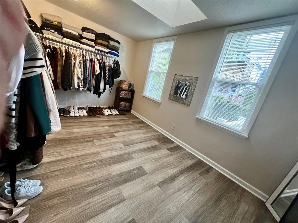 237 Lelia Street Pittsburgh, PA 15211 - Photo 27 of 46 a view of walk in closet with clothes and shoes