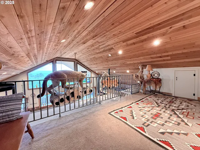 a view of a chairs and table in front of a house