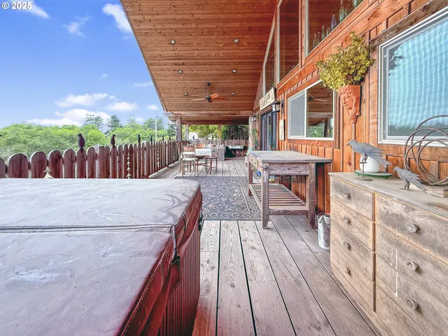 a view of roof deck with patio