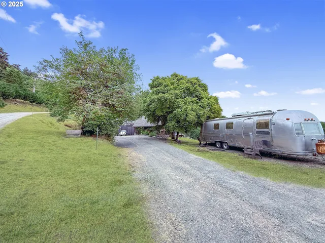 a house view with a garden space