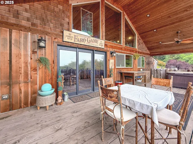 a view of a chairs and table in a patio