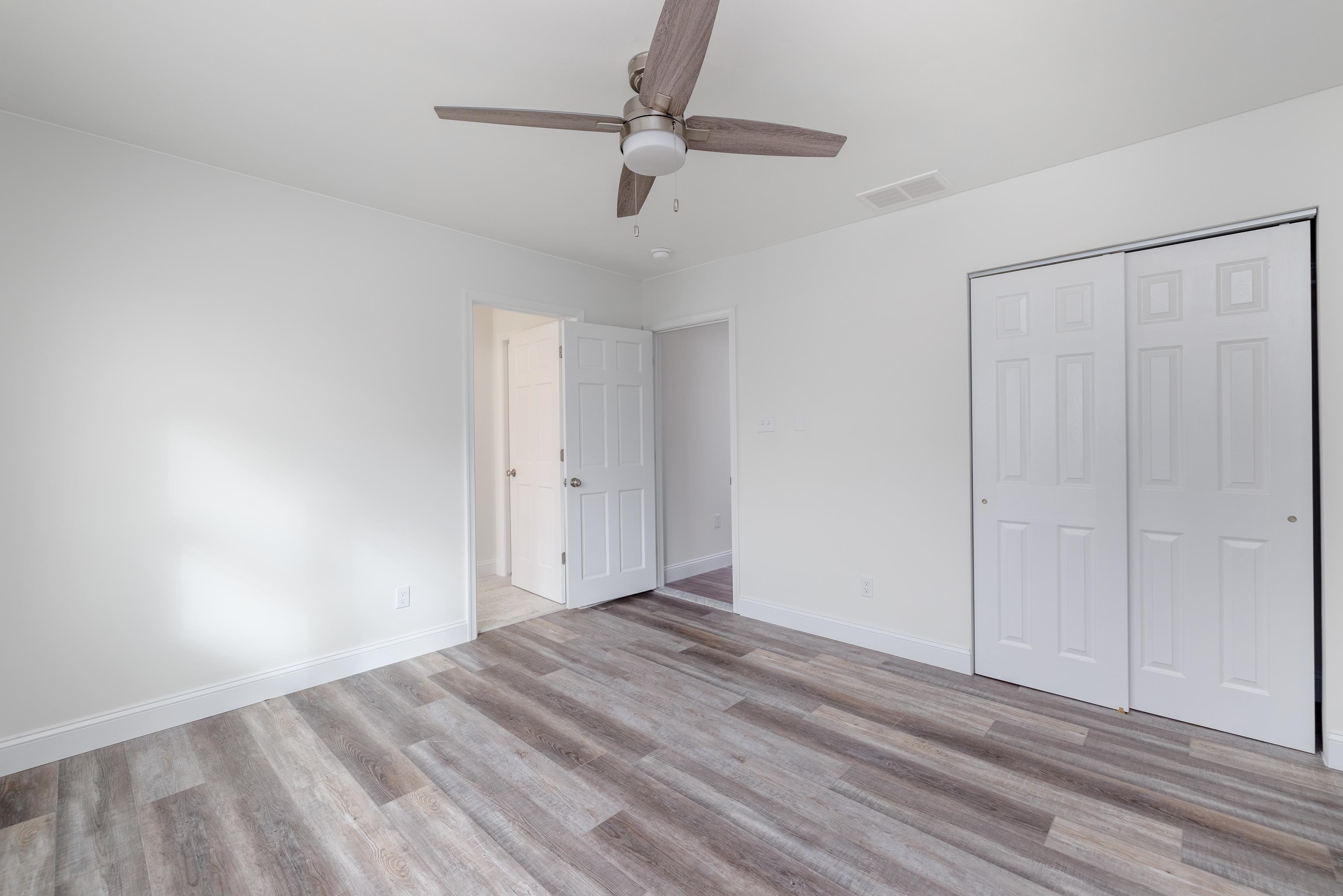 121 Broadway Villas, NJ 08251 - Photo 23 of 32 wooden floor in an empty room