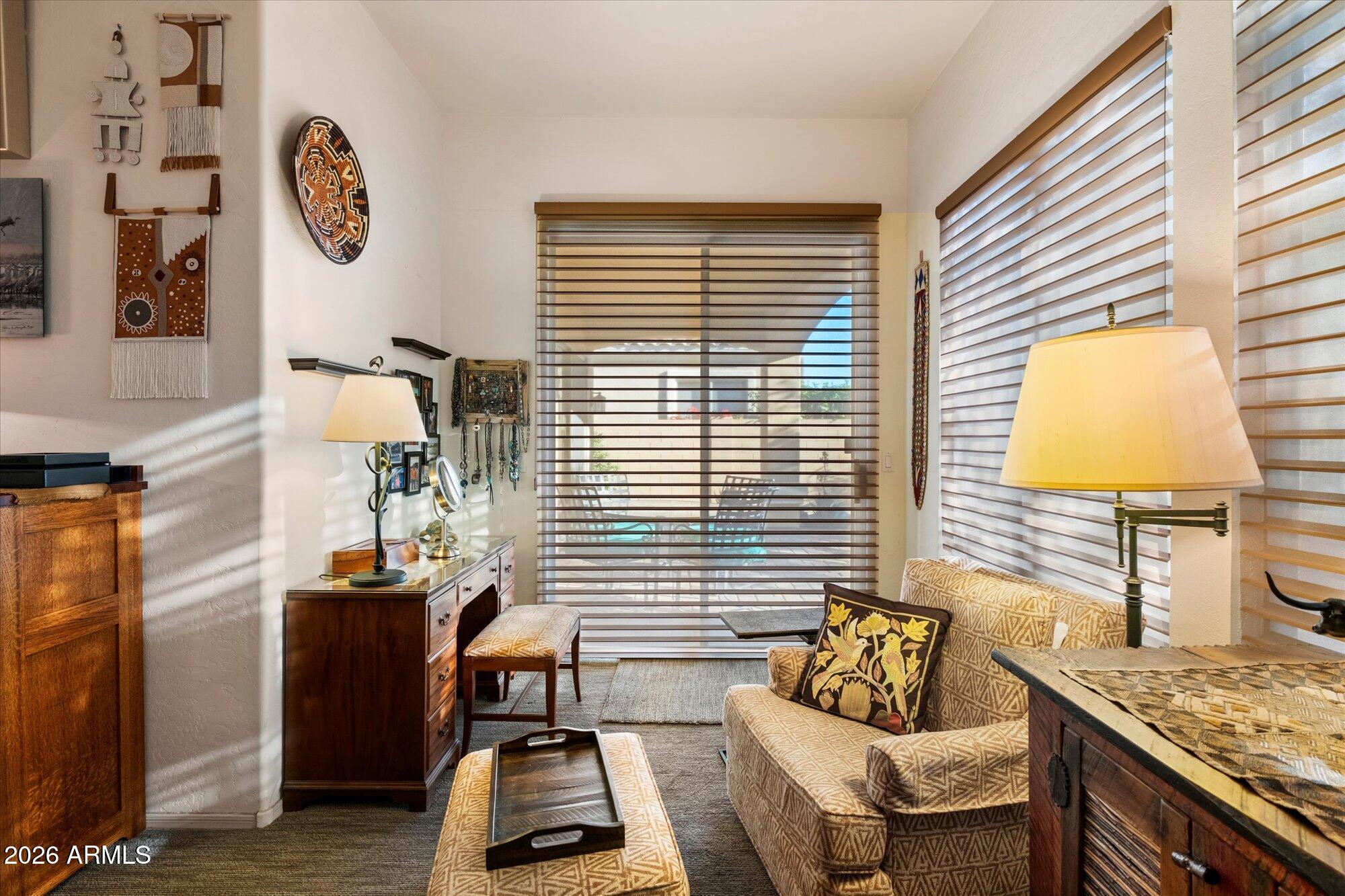 5025 East Kirkland Road Phoenix, AZ 85054 - Photo 21 of 37 a living room with furniture and a window
