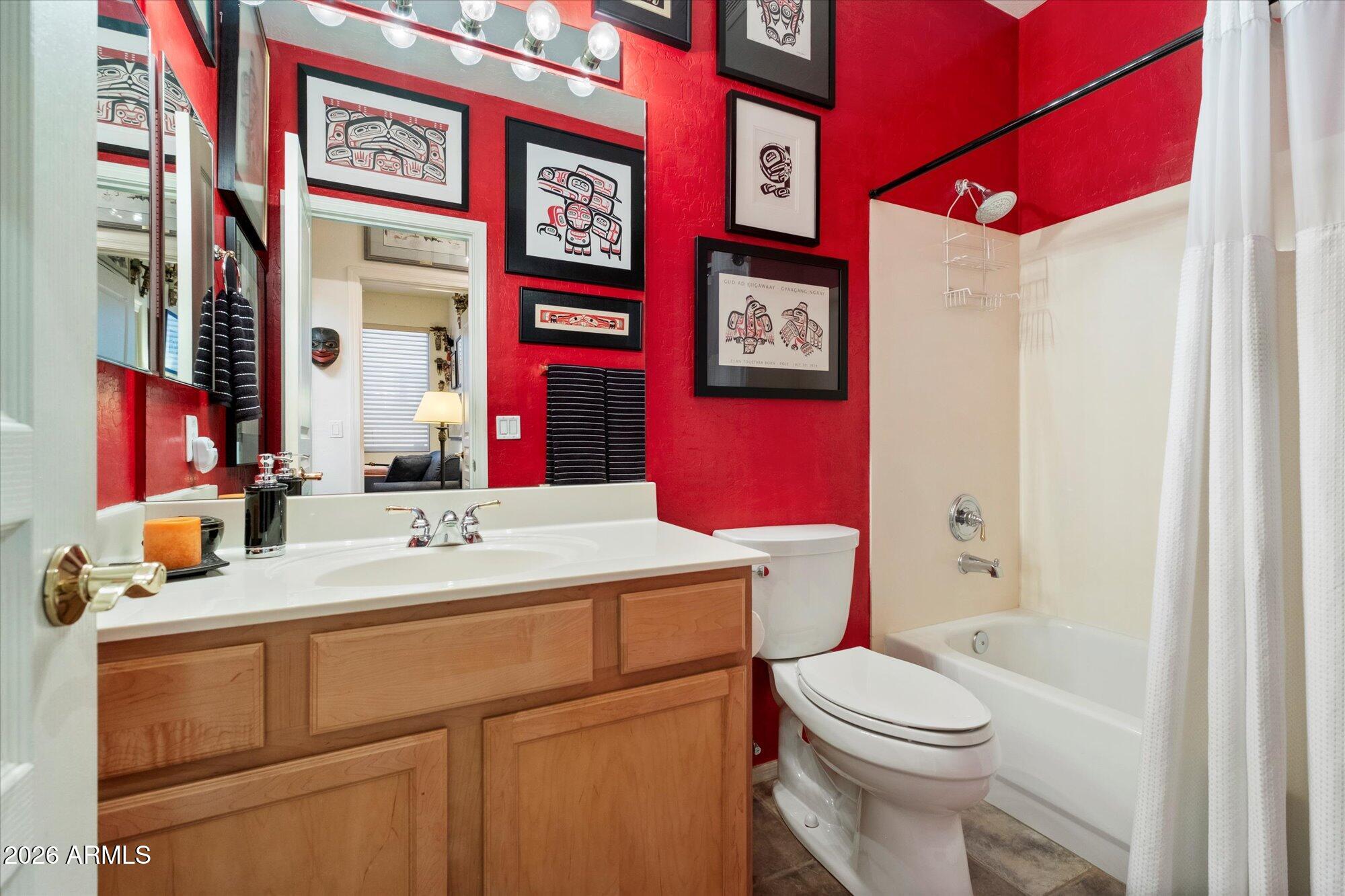 5025 East Kirkland Road Phoenix, AZ 85054 - Photo 26 of 37 a bathroom with a sink vanity mirror and toilet