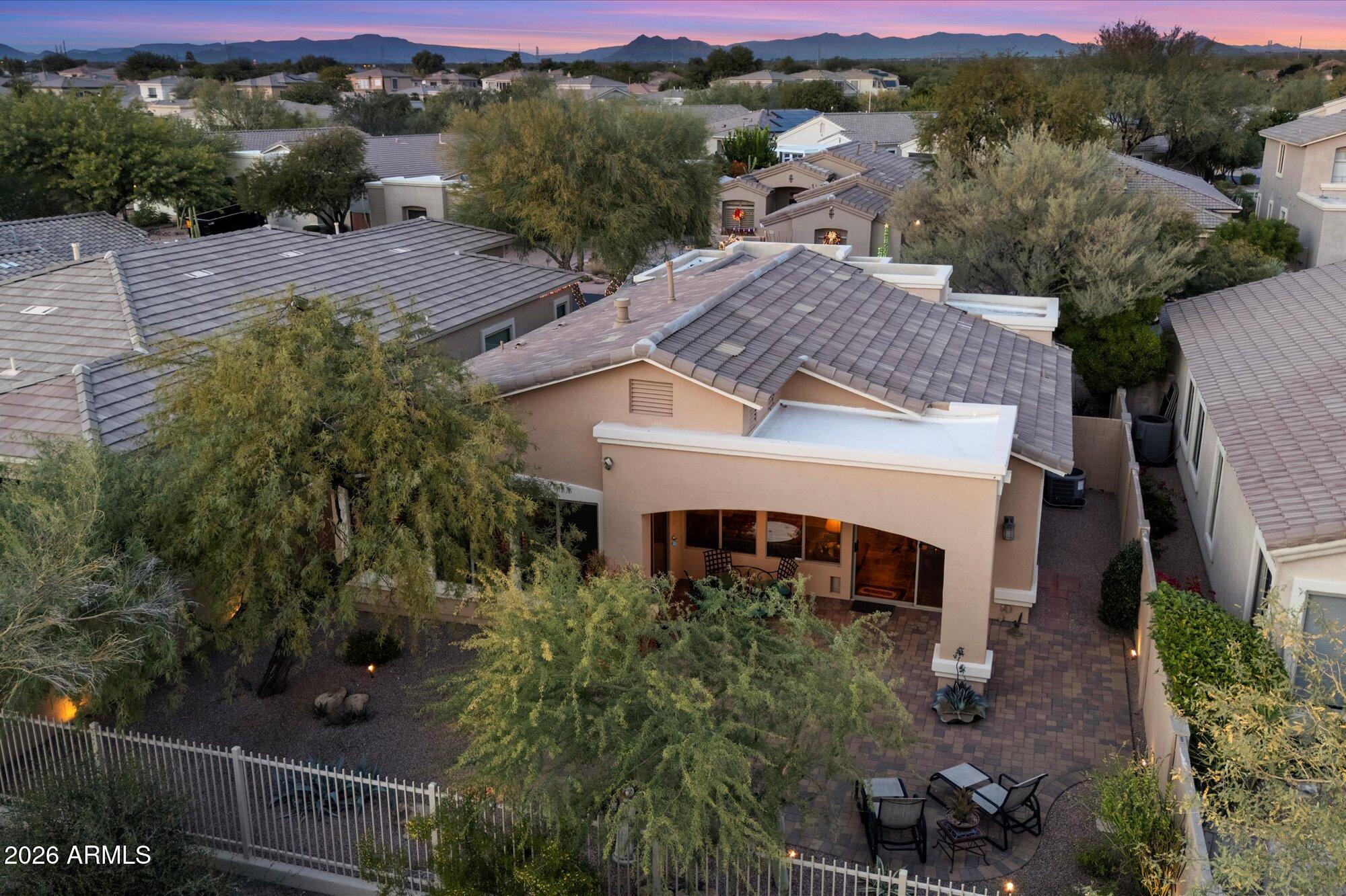 5025 East Kirkland Road Phoenix, AZ 85054 - Photo 30 of 37 an aerial view of a house with a yard