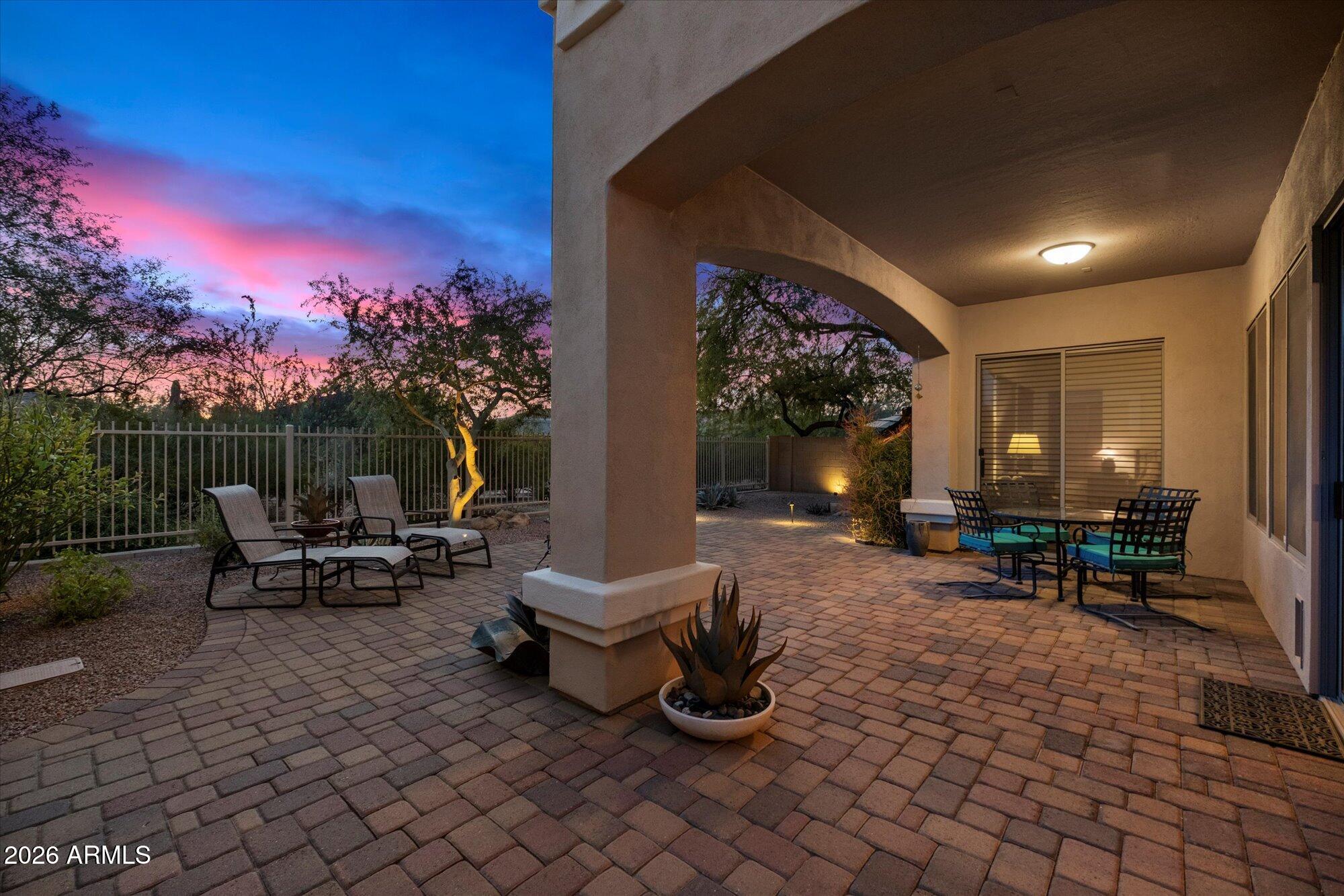 5025 East Kirkland Road Phoenix, AZ 85054 - Photo 4 of 37 a view of a backyard with sitting area