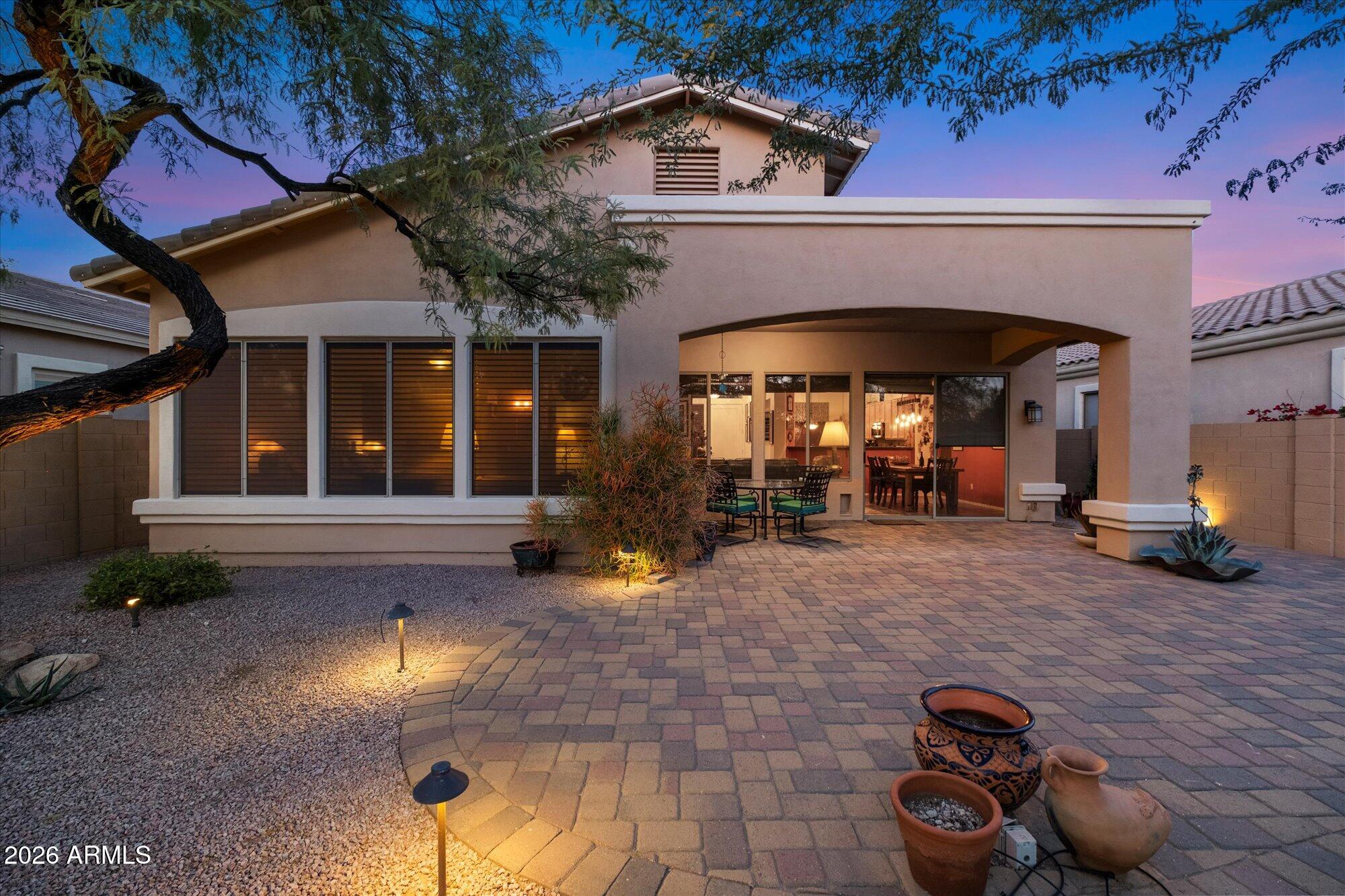 5025 East Kirkland Road Phoenix, AZ 85054 - Photo 6 of 37 a view of a house with patio