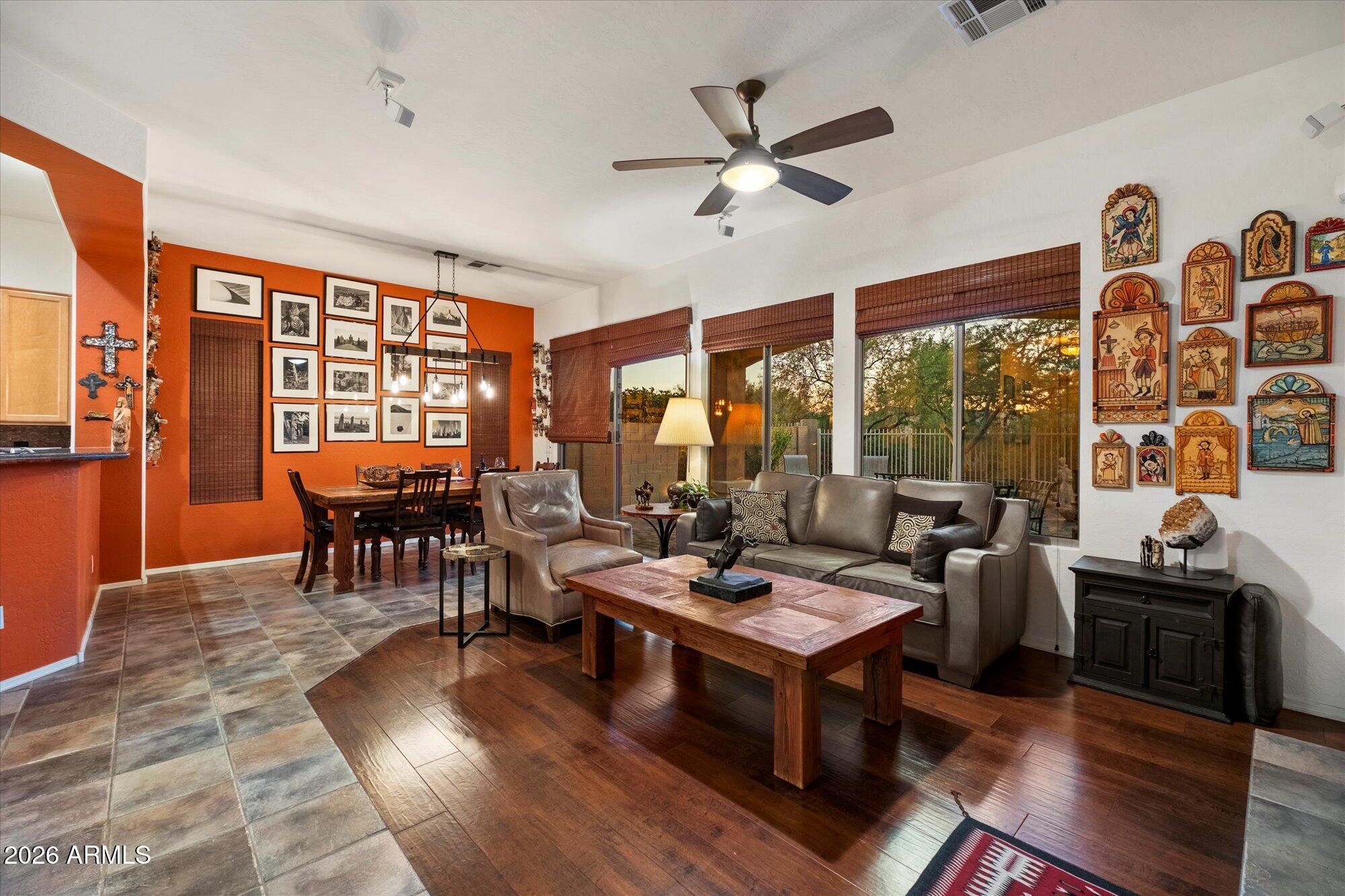 5025 East Kirkland Road Phoenix, AZ 85054 - Photo 9 of 37 a living room with furniture and a large window
