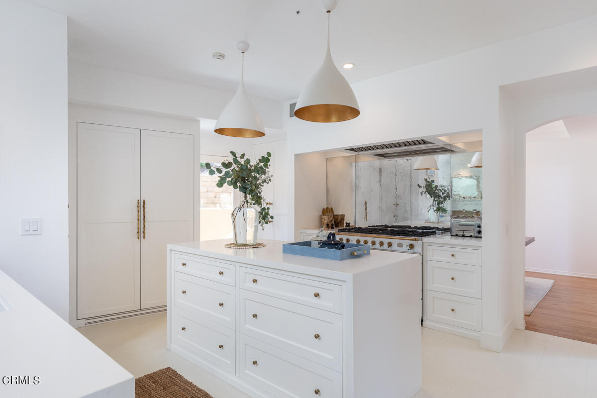 1437 Rutherford Drive Pasadena, CA 91103 - Photo 11 of 44 a kitchen with white cabinets and window