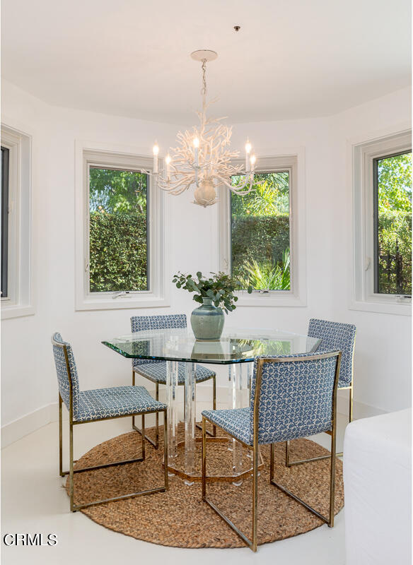 1437 Rutherford Drive Pasadena, CA 91103 - Photo 14 of 44 a dining room with furniture and window