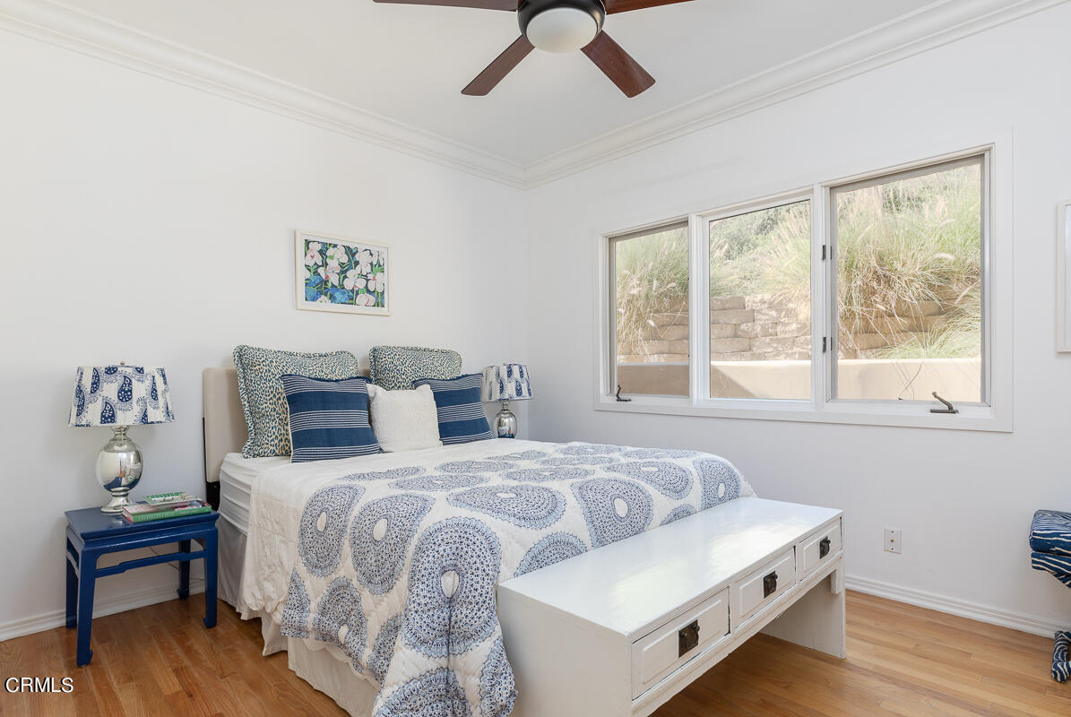 1437 Rutherford Drive Pasadena, CA 91103 - Photo 15 of 44 a bedroom with a bed and a table