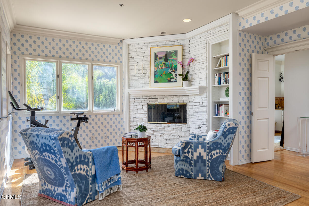 1437 Rutherford Drive Pasadena, CA 91103 - Photo 25 of 44 a living room with furniture and a fireplace