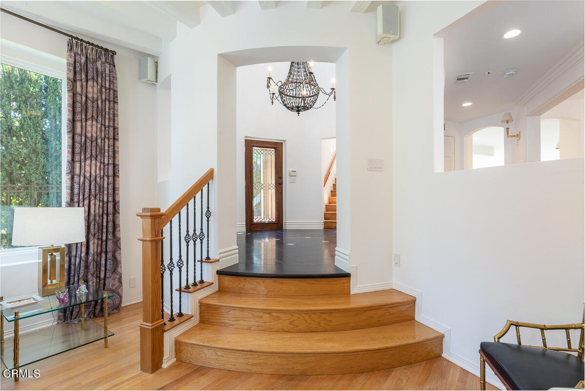 1437 Rutherford Drive Pasadena, CA 91103 - Photo 4 of 44 a view of entryway and hall with wooden floor