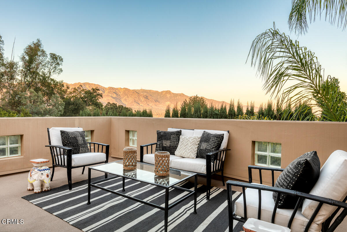 1437 Rutherford Drive Pasadena, CA 91103 - Photo 34 of 44 a view of a patio with couple of chairs