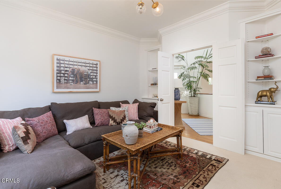 1437 Rutherford Drive Pasadena, CA 91103 - Photo 36 of 44 a living room with furniture and a rug