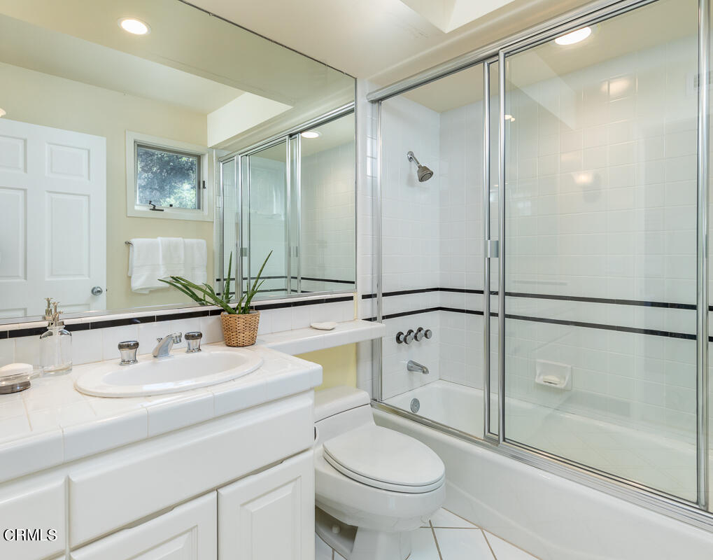 1437 Rutherford Drive Pasadena, CA 91103 - Photo 38 of 44 a bathroom with a sink toilet and shower