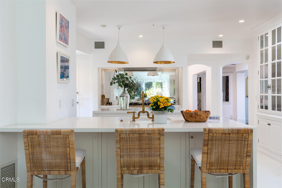1437 Rutherford Drive Pasadena, CA 91103 - Photo 8 of 44 a bathroom with a sink and a mirror