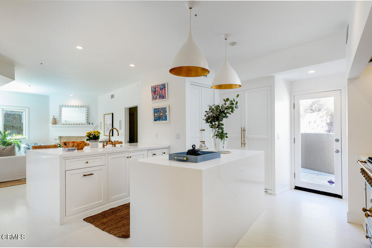 1437 Rutherford Drive Pasadena, CA 91103 - Photo 10 of 44 a kitchen with a sink and a stove