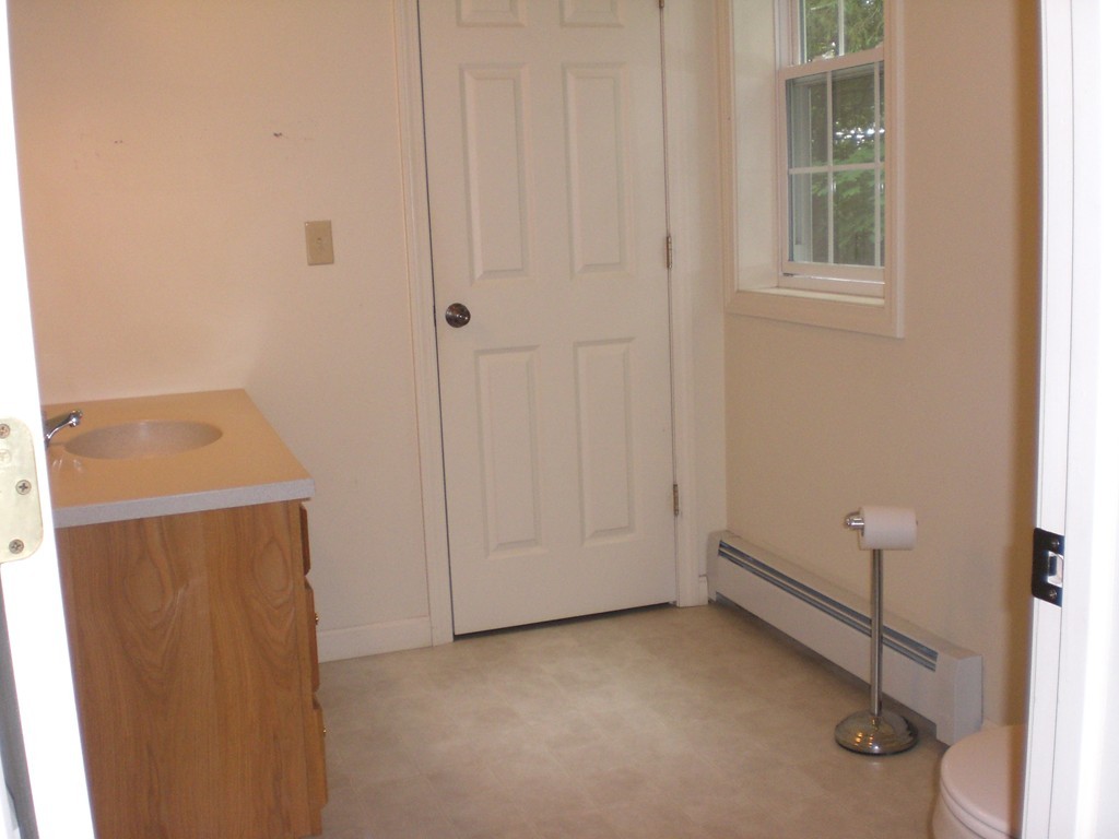 3 Oakham Road North Brookfield, MA 01535 - Photo 13 of 24 a view of a storage and utility room with a window