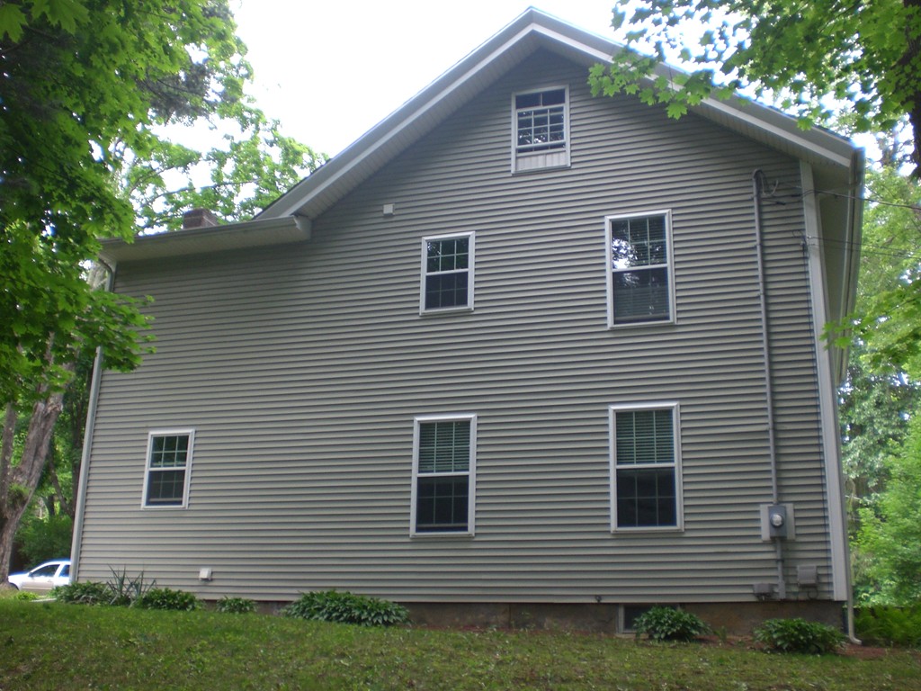 3 Oakham Road North Brookfield, MA 01535 - Photo 3 of 24 a view of a house with a backyard