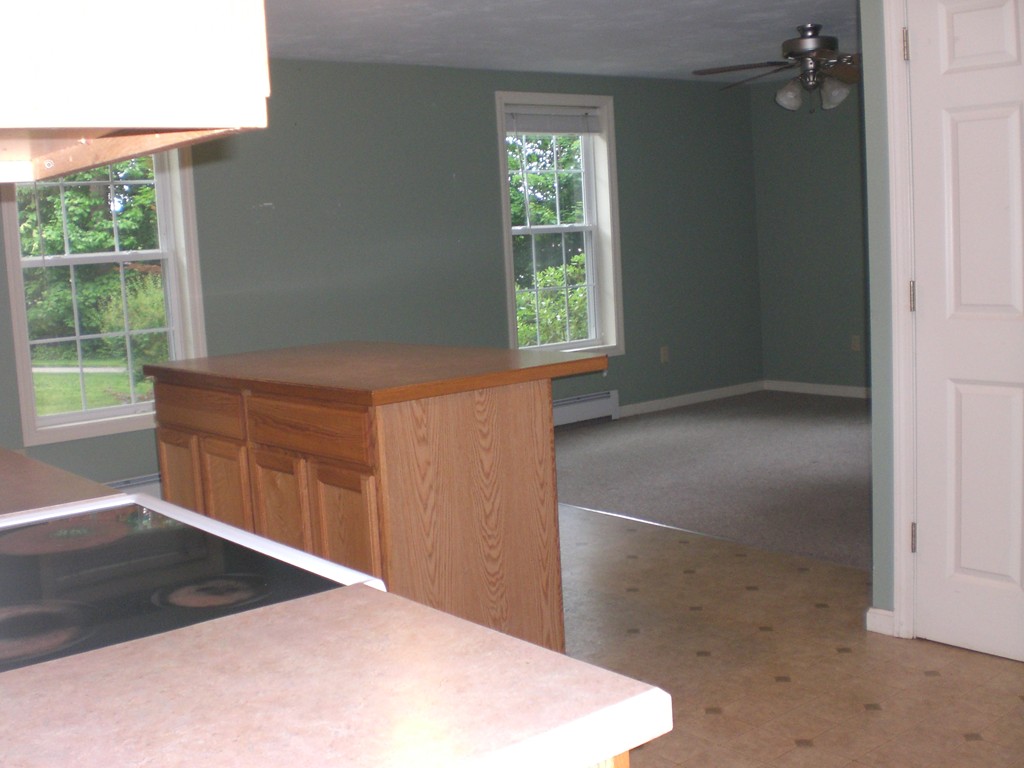 3 Oakham Road North Brookfield, MA 01535 - Photo 5 of 24 an empty room with windows