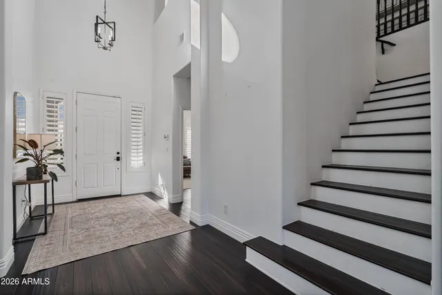 a view of a backyard of the house