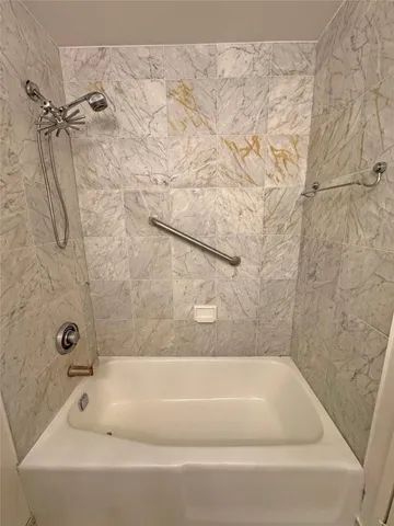 a bathroom with a bathtub