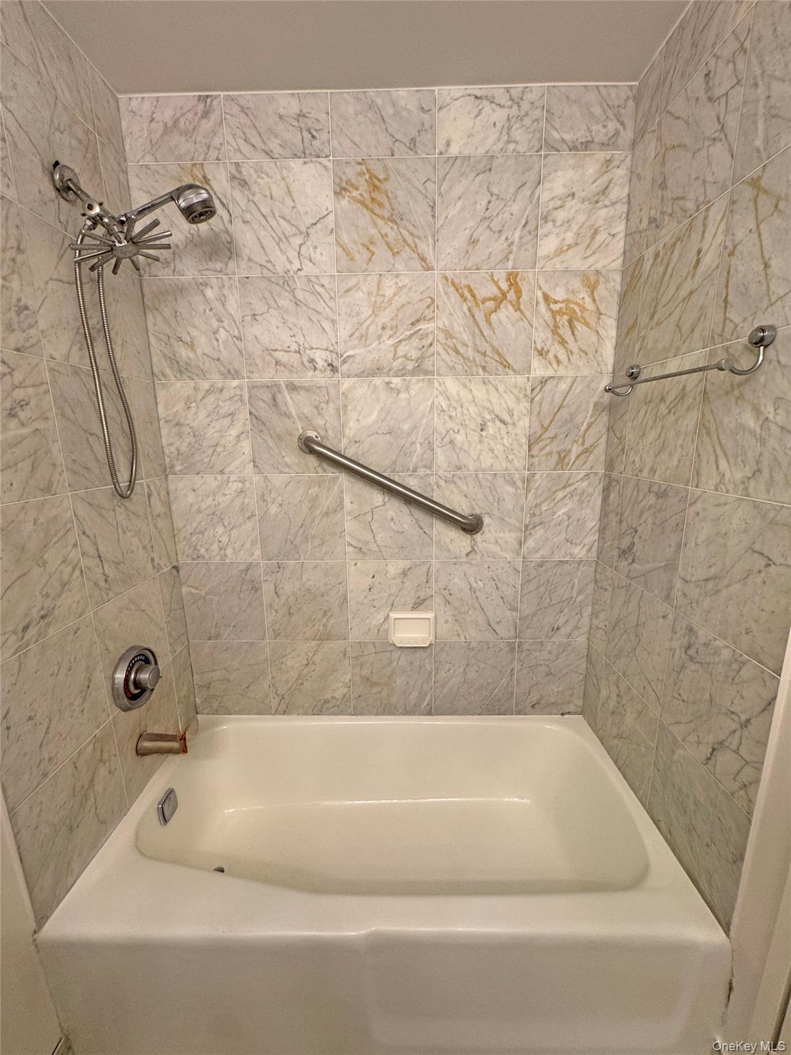 280 Rector Place, Unit 1G Manhattan, NY 10280 - Photo 7 of 17 a bathroom with a bathtub