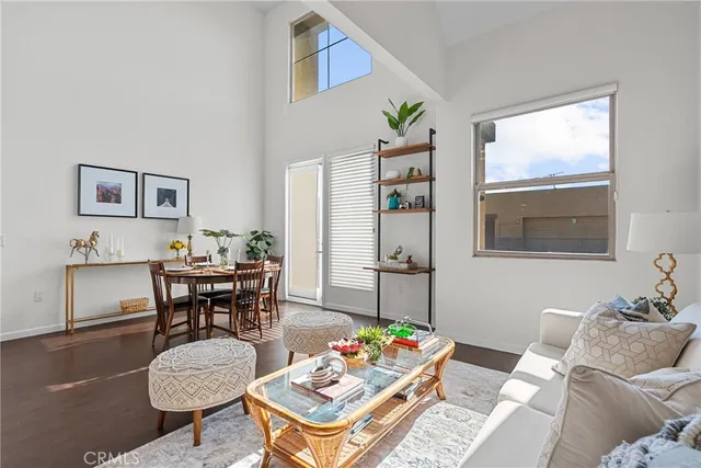 a view of a balcony with table and chairs