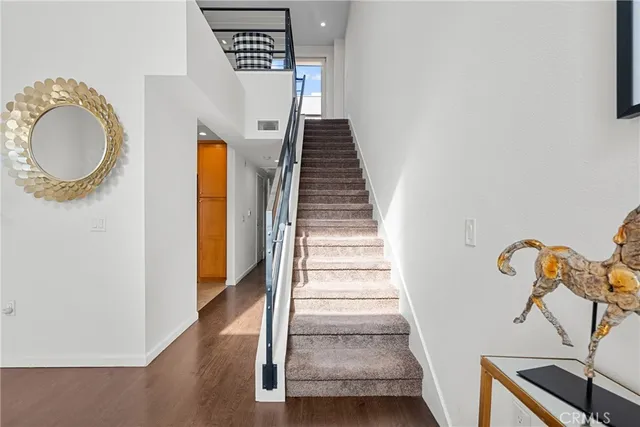 a bedroom with a bed and a view of bathroom