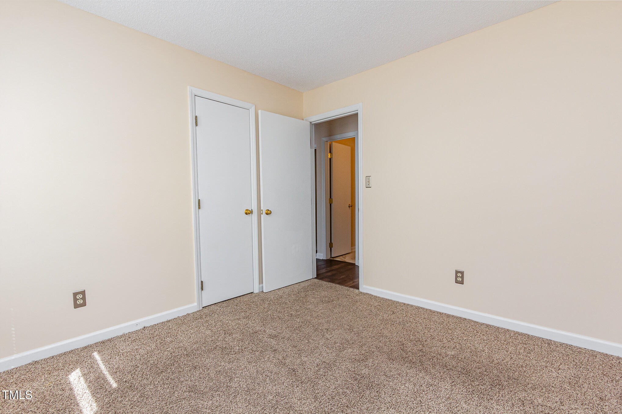 3332 Castlegate Drive Raleigh, NC 27616 - Photo 16 of 22 a view of a room with an empty space