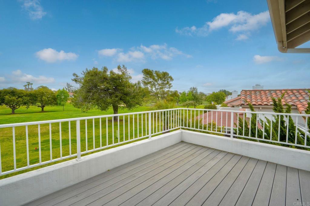 4760 Galicia Way Oceanside, CA 92056 - Photo 26 of 56 a view of balcony with wooden floor
