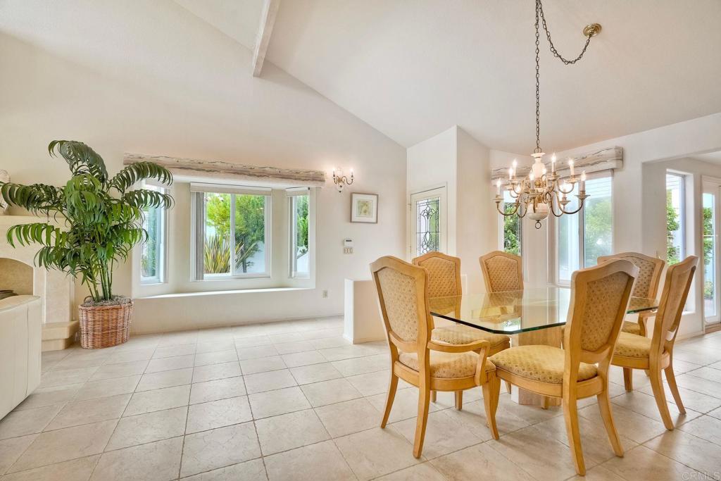 4760 Galicia Way Oceanside, CA 92056 - Photo 8 of 56 a dining room with furniture and window