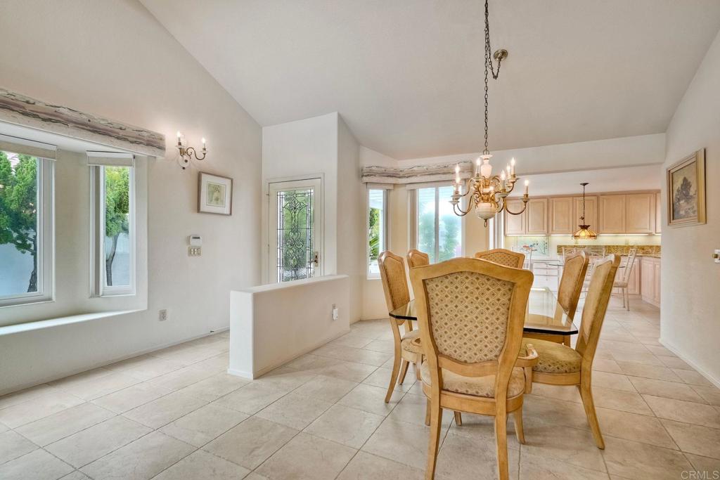 4760 Galicia Way Oceanside, CA 92056 - Photo 9 of 56 a view of a dining room with furniture window and outside view