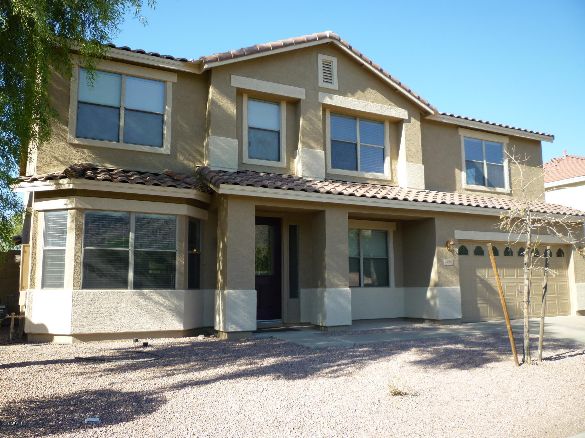 1210 East Pedro Road Phoenix, AZ 85042 - Photo 1 of 74 Front