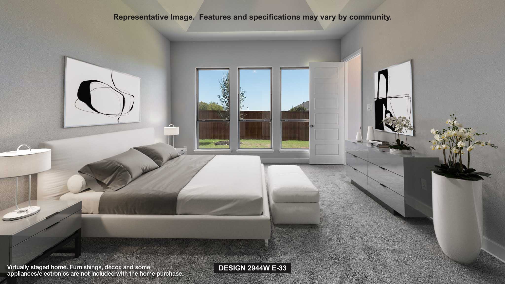 165 Maddy Way Bastrop, TX 78602 - Photo 5 of 23 a bedroom with a large bed and a potted plant