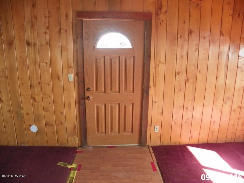 8299 Nutt Lane Snowflake, AZ 85937 - Photo 13 of 28 a view of a door with a wooden door