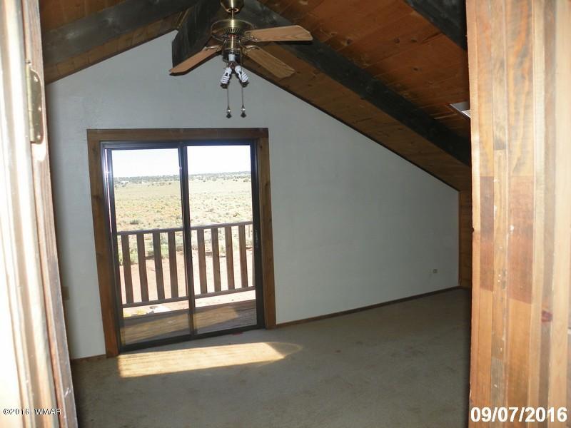 8299 Nutt Lane Snowflake, AZ 85937 - Photo 18 of 28 a view of an empty room and window