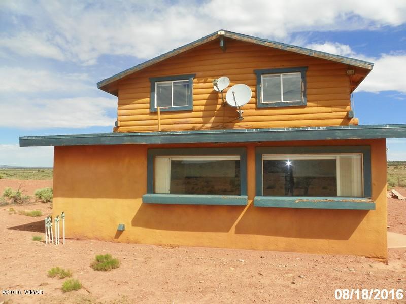 8299 Nutt Lane Snowflake, AZ 85937 - Photo 27 of 28 a view of a house with wooden fence