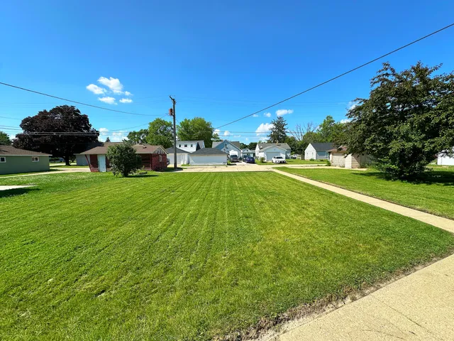 a view of a golf course with a garden