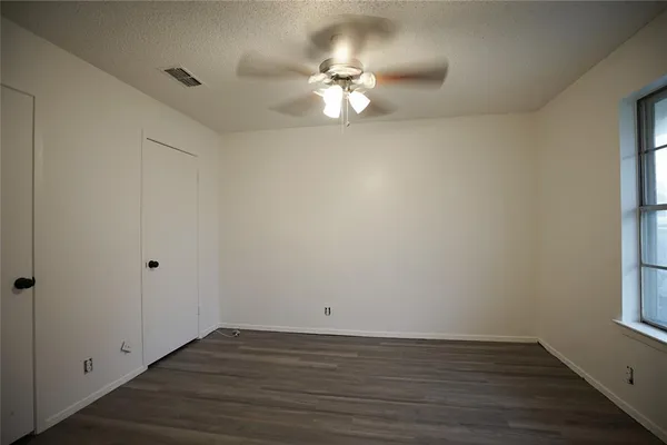 a view of a livingroom with a fan