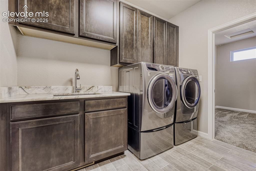 13680 Woodlake Road Elbert, CO 80106 - Photo 29 of 46 Main level laundry