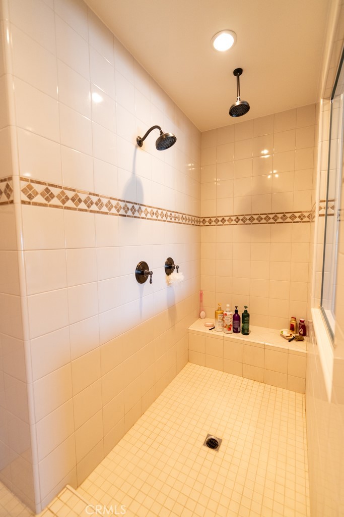 5075 Branding Iron Place Rancho Cucamonga, CA 91739 - Photo 24 of 41 a bathroom with a tub