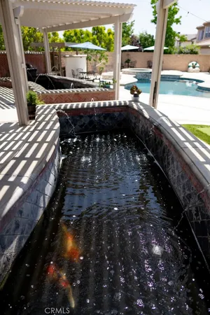 a view of balcony with a yard