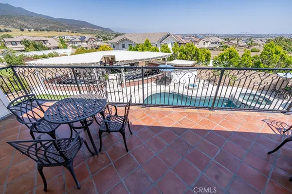 a view of balcony with furniture