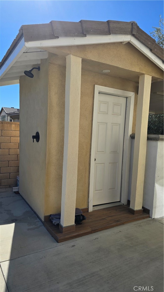 5075 Branding Iron Place Rancho Cucamonga, CA 91739 - Photo 38 of 41 a view of a front door and bedroom