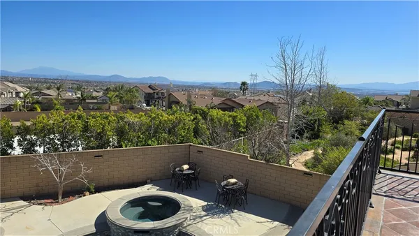 a view of balcony with furniture
