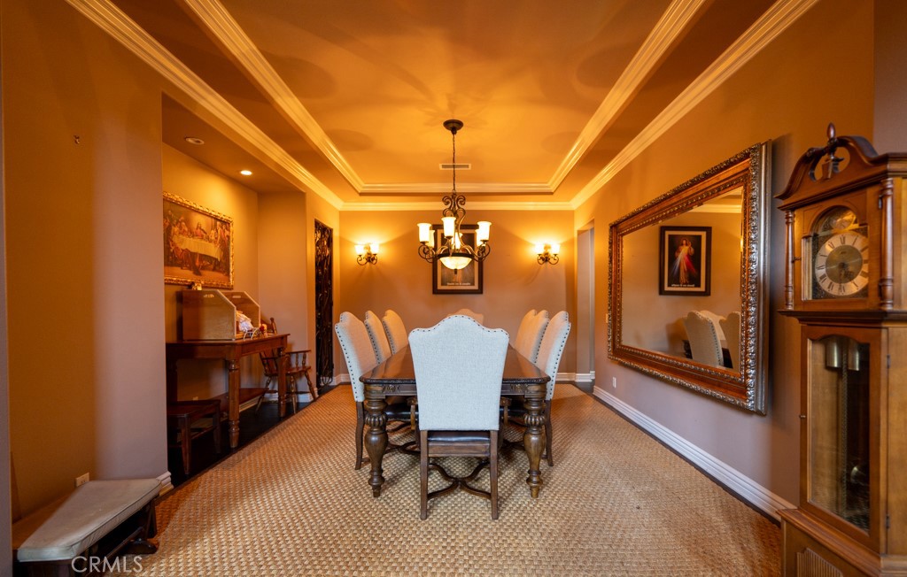 5075 Branding Iron Place Rancho Cucamonga, CA 91739 - Photo 6 of 41 a view of a dining room with furniture window and wooden floor