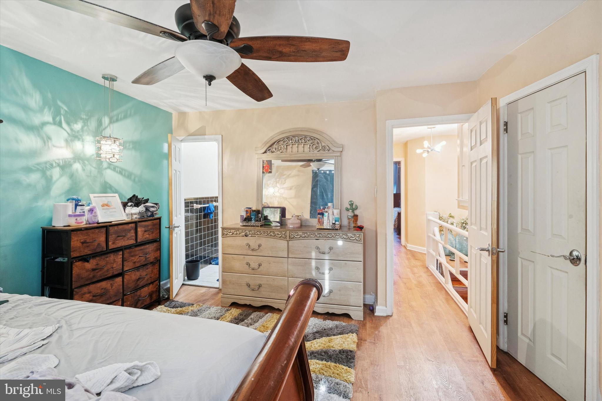 213 East Claremont Road Philadelphia, PA 19120 - Photo 16 of 25 a room with a bed and a dresser