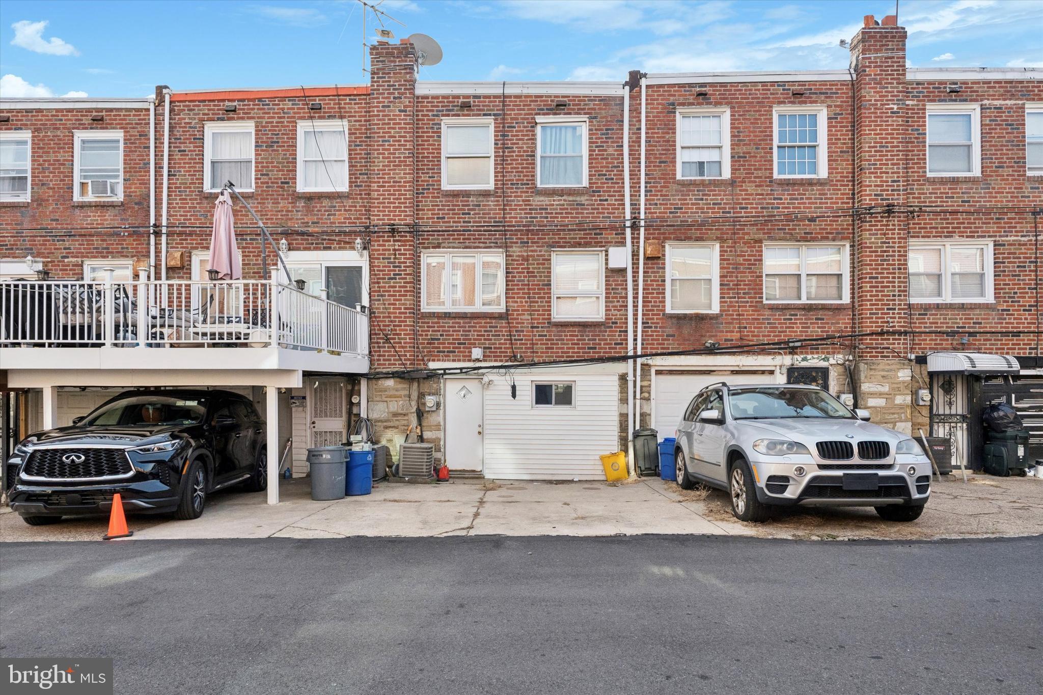 213 East Claremont Road Philadelphia, PA 19120 - Photo 25 of 25 a car parked in front of a building